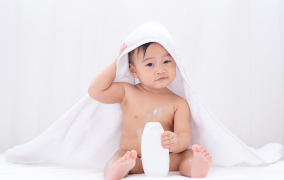 Clariant Image Asian cute baby wearing white towel after taking a bath 20240611